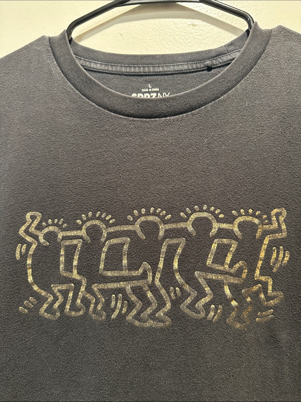 Keith Haring Uniqlo Graphic Black Tee with Gold Dancing Figures